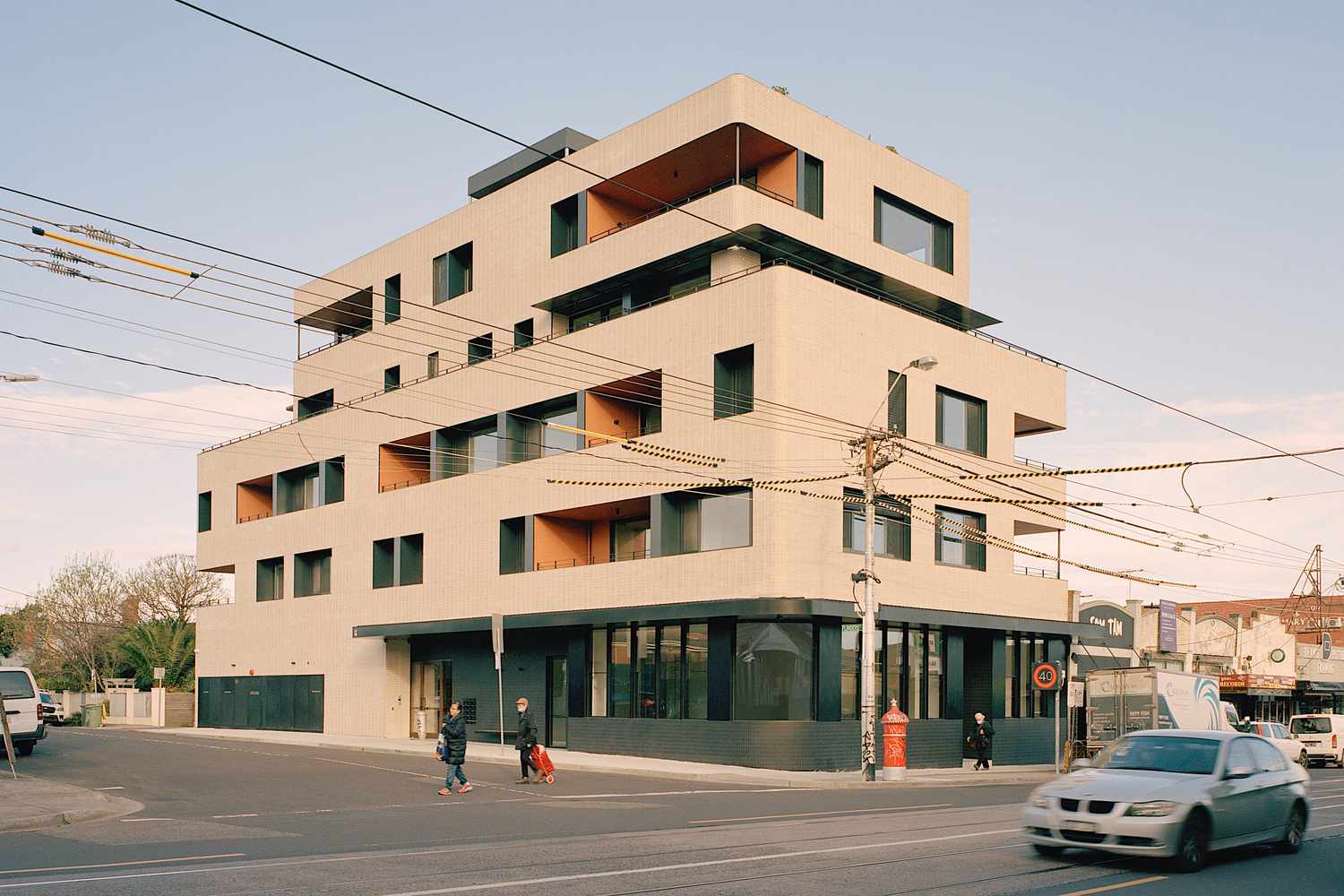 Australian Condominium Reveals How Single Stairs Make Small Buildings Elevated